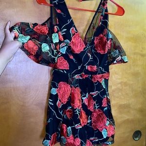 A black and red rose romper
